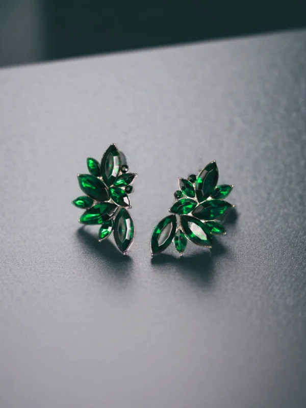 Artificial emerald green cluster earrings – party wear jewellery with leaf-inspired design.