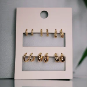 Set of 6 gold hoop earrings in polished and textured artificial jewellery design.