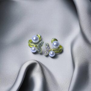 Artificial butterfly-shaped earrings with pearls and crystals – women’s Pakistani jewellery.